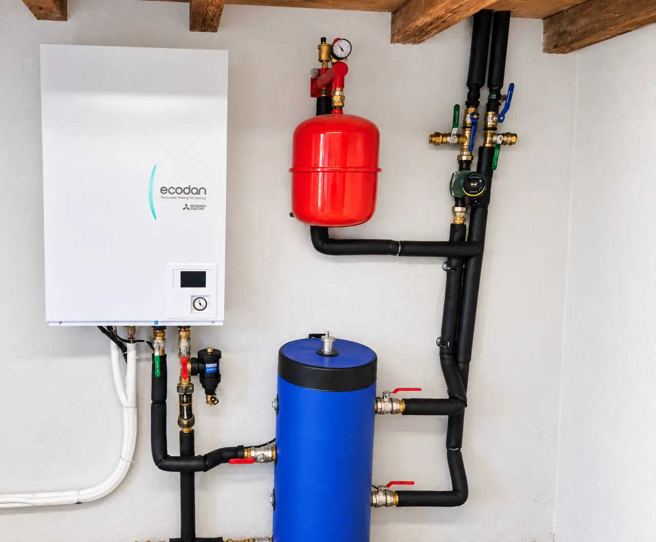 Unité intérieure Mitsubishi Electric raccordée au plancher chauffant et aux radiateurs d'une maison de Lingolsheim